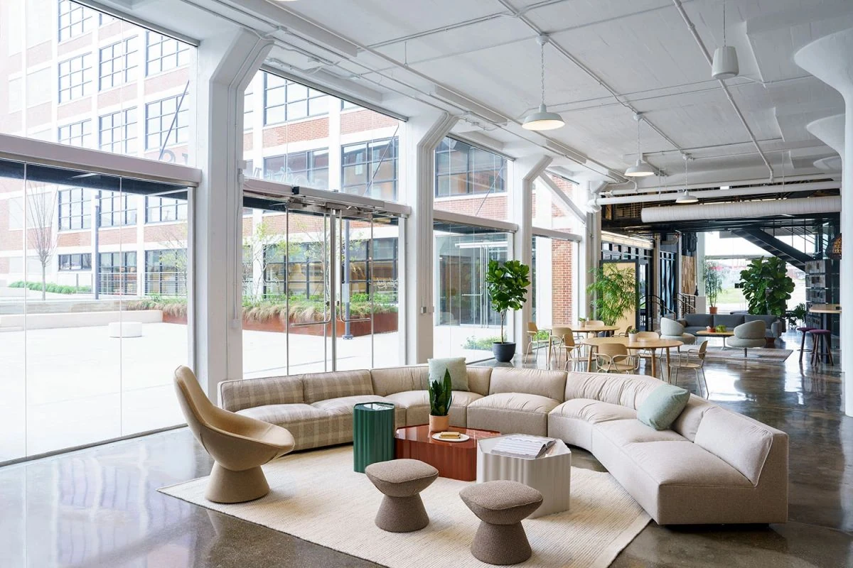 Studio TK lounge with sculptural tables and collaborative seating