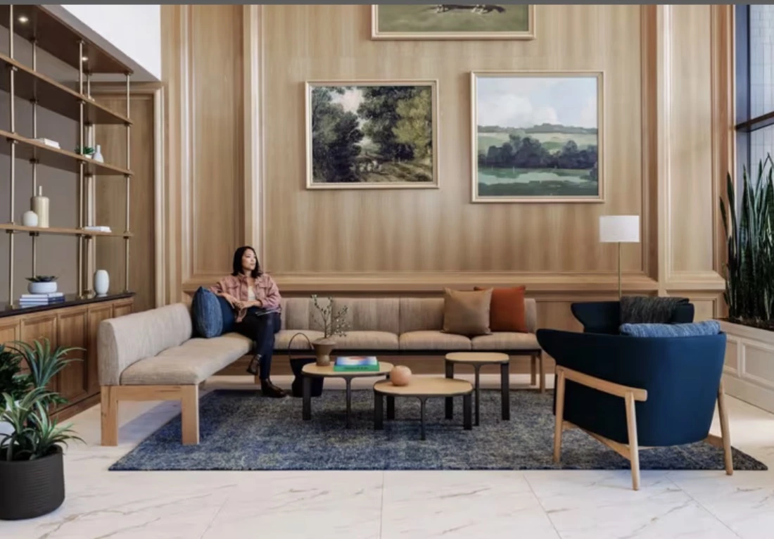 Lounge setting with upholstered seating, wood finishes and occasional tables